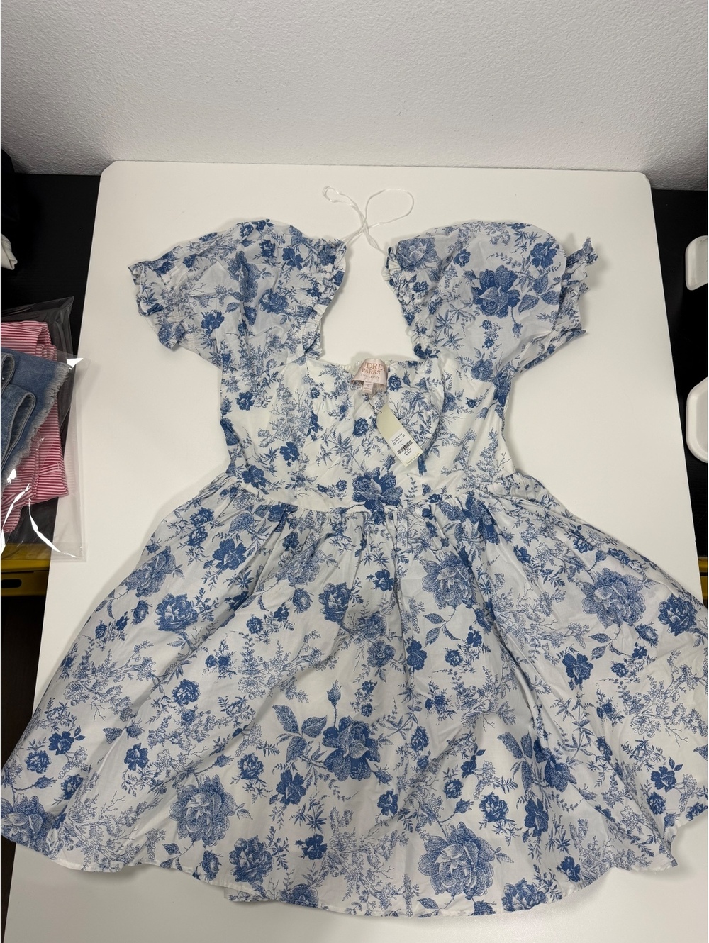 Audrey Parks blue floral dress with ruffled sleeves a flowy skirt #floraldress